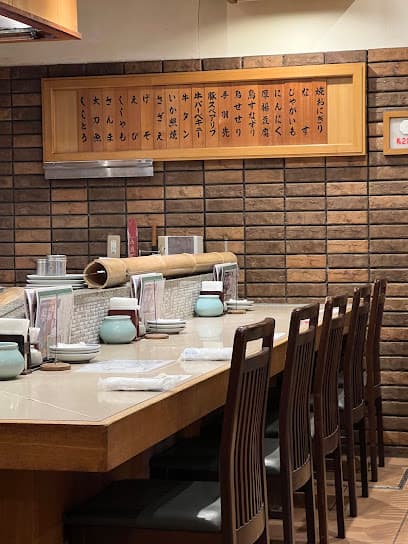 (株)助格 湊町店